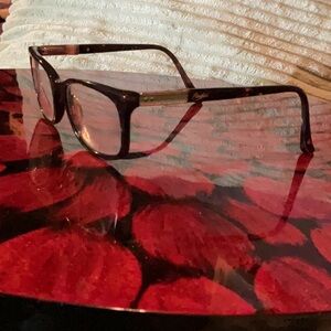 Candie's Prescription Glasses Dark Brown Tortoise with teal on arms. 50-18-135.